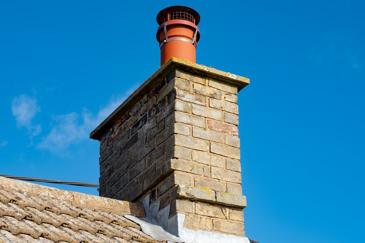chimney being repaired by our team in Dublin. Photo of the flashing around the chimney.