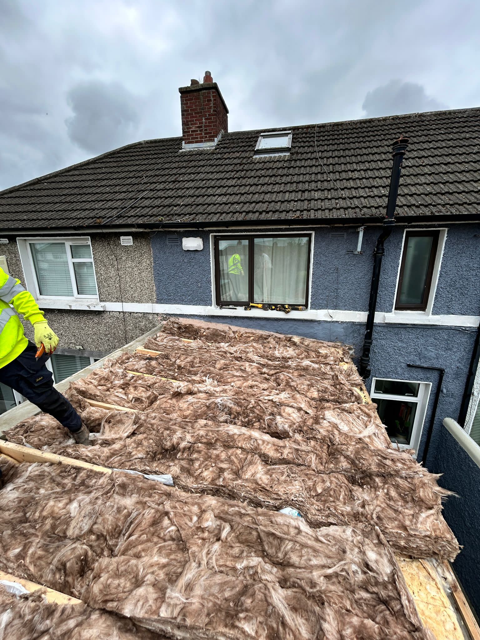 A flat roof with membrane removed showing insulation underneath in Dublin